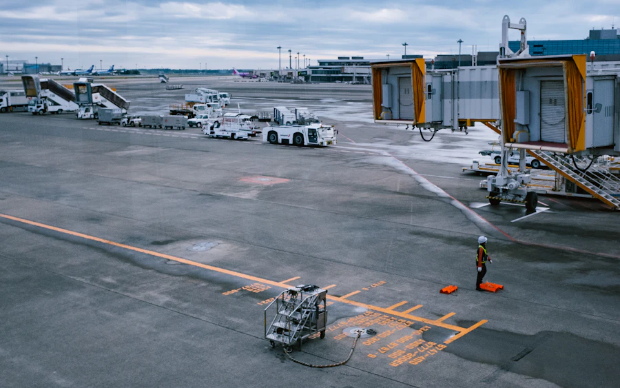 Aircraft and ground crew on an airport tarmac