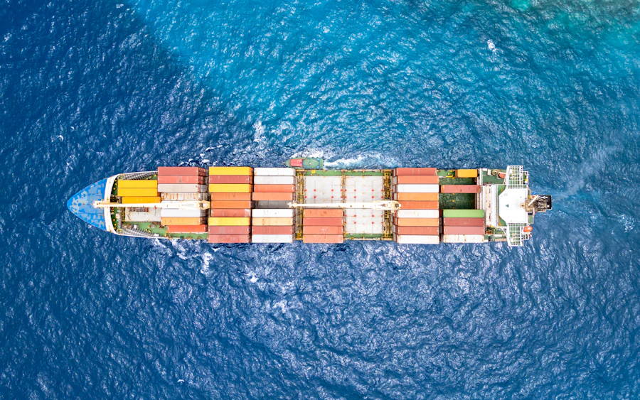 Cargo vessel operating at sea, viewed from above