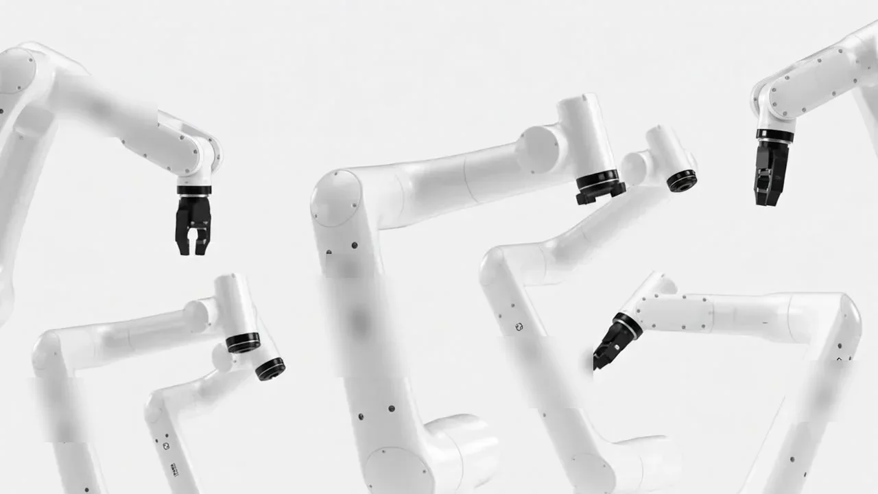 Multiple collaborative robot arms working across a shared production cell